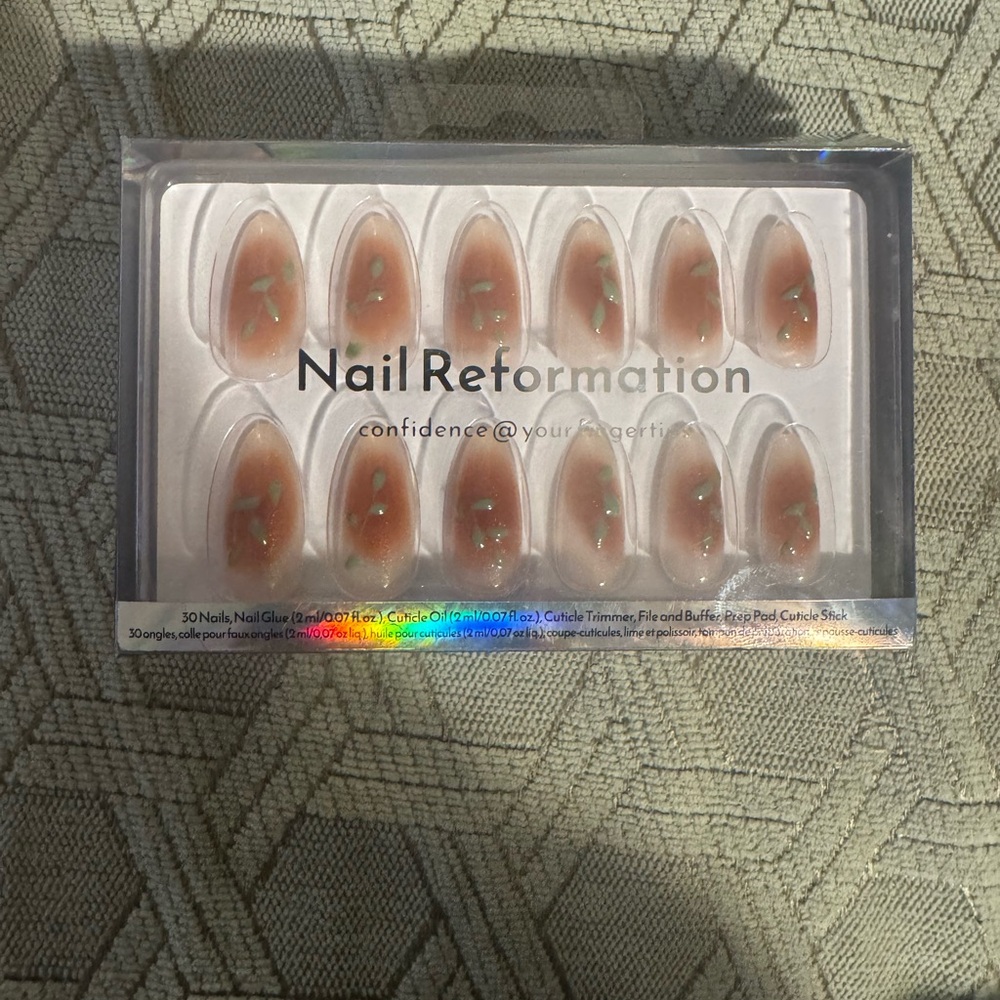 Nail Reformation Maple Leaf press ons, almond shape, medium length.
